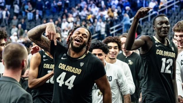 Eddie Lampkin Jr. and Dak celebrate at T-Mobile Arena